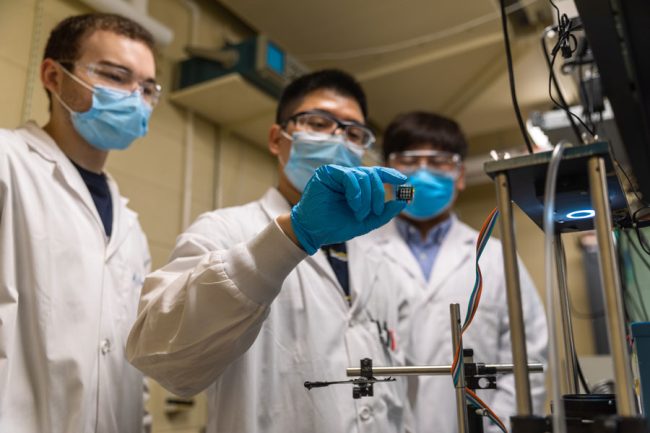 researchers testing the stability of perovskite solar cells